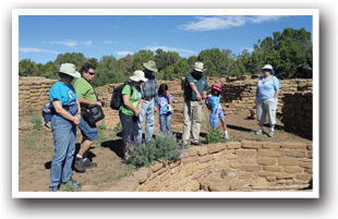 Group at Kiva site in Mesa Verde National Park, Colorado.